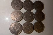 coins circle of hands 50p x 9