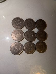 coins circle of hands 50p x 9