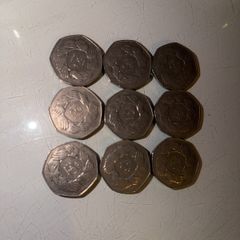 coins circle of hands 50p x 9