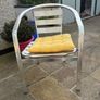 Set of matching patio chairs and four yellow seat pads Image 2