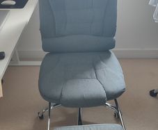 Office chair with foot rest and attachable armrests