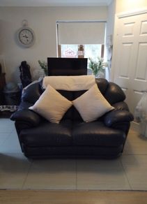 2 seater navy Italian leather sofa
