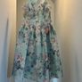 Chi Chi dress in size 16. New never worn . Pretty dress to wear on Weddings or any special occasion . Image 2