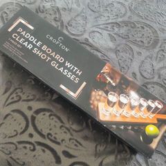 Shot glasses and board