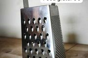 Stainless steel box grater with wooden handle