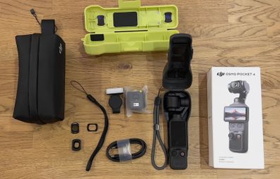 DJI Osmo Pocket 4 gimbal camera, with many accessories