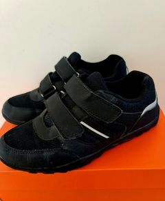 boys black trainers in size UK 4