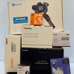 Fujifilm XS10 + Tamron 17-70 mm f/2.8 + VILTROX 33mm f/1.4 + Godox V860III + FeiyuTech AK2000C + 2 original & 2 Duracell batteries & 52mm & 67mm VND + Comica CVM-V30 Lite Shotgun Microphone + Teleprompter + Macro extension tube