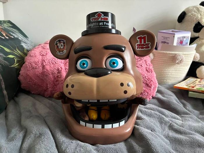 Five Nights at Freddys plushies and dragon figures