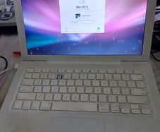 Another vinyage Apple MacBook, has an account, no Battery or charger, no 4 key missing, in very good condition otherwise