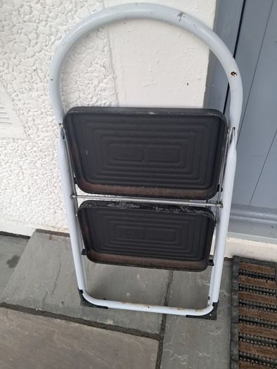 Two-step folding ladder