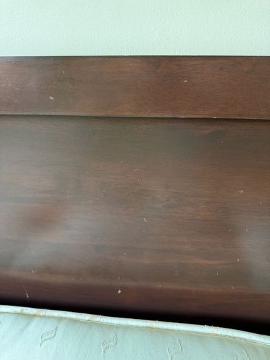 Queen size bed with wooden frame