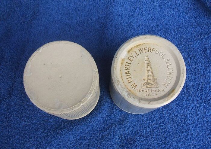 W. P. HARTLEY (jams, marmalades & jellies) - two antique stoneware jars, one with lighthouse imprint (c.1900)