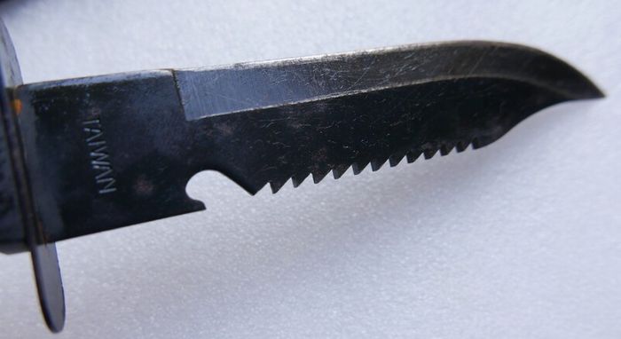 Vintage 1980s Survival Knife with compass and a storage compartment in the knife handle