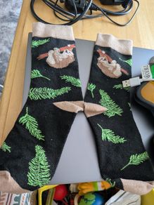 Sloth print socks - black and green