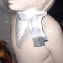 Old Ornament of a Boy in a Winter Hat and Light Colored Clothing on Skis, Made in Spain. Image 3