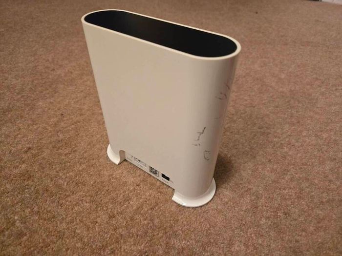 Arlo Pro 4 three cameras, a base station, solar panels