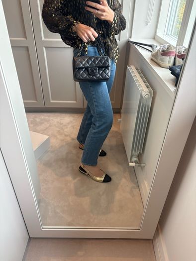 Rare all black C single flap bag.