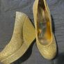 Gold wedge heels Image 2