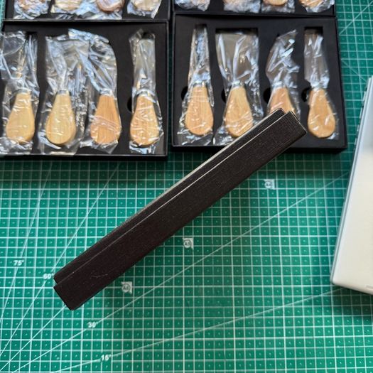 5 sets of boxed cheese knives