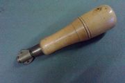 Old boxwood and brass tool pad with tools