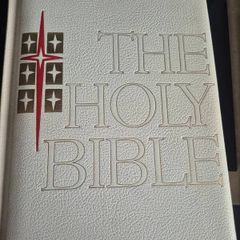 is a vintage Catholic edition of The Holy Bible featuring a padded white textured cover with red and gold or blind-embossed lettering, commonly published by Good Counsel Publishers or J.G. Ferguson during the 1960s and 1970s