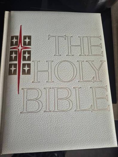 is a vintage Catholic edition of The Holy Bible featuring a padded white textured cover with red and gold or blind-embossed lettering, commonly published by Good Counsel Publishers or J.G. Ferguson during the 1960s and 1970s