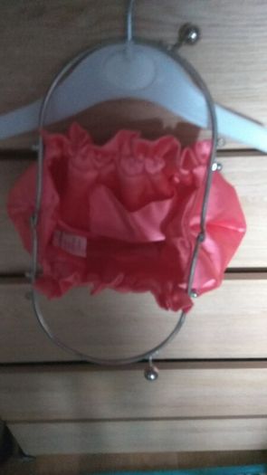 coral clutch bag never worn