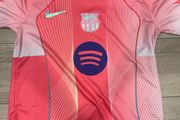 Pink Barcelona football jersey