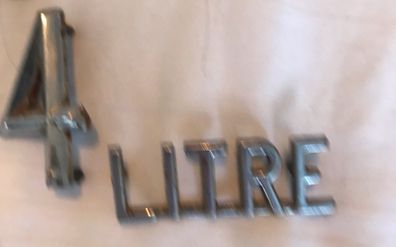 Old metal car badge 1960s or 70s could be off an E-type jag not sure though