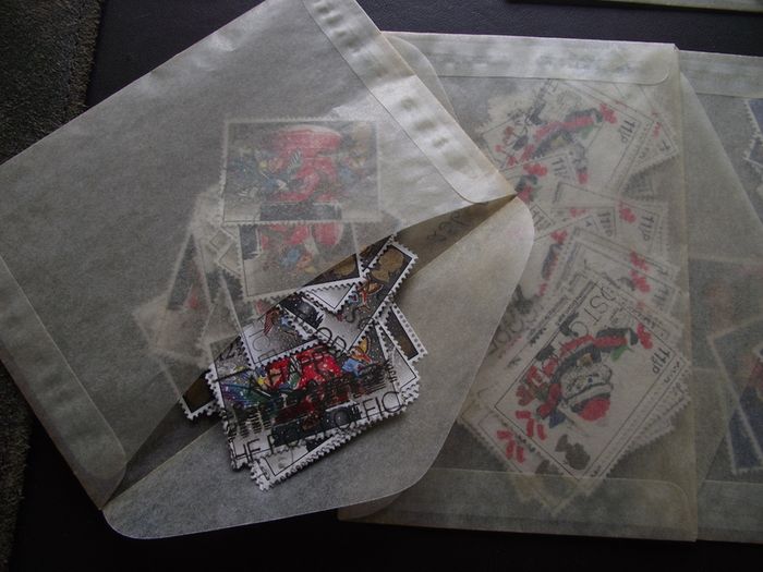 A box with collection of stamps from Great Britain
