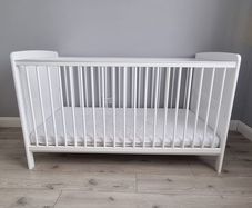 White cot bed.