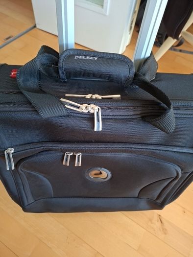 Delsey wheelie suitcase.