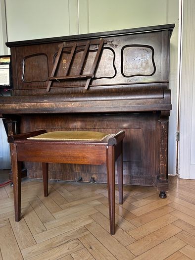 Upright piano and stool