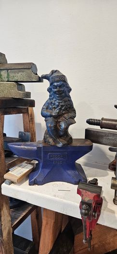 anvil on timber stand