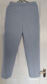 Stylish ladies size 10, baby blue trousers.