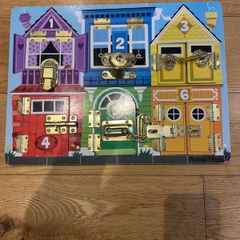 Melissa and Doug latch puzzle