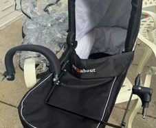 Out and About double carrycot summit black and double carrycot adapter and rain cover included