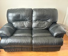 Two seater leather recliner sofa