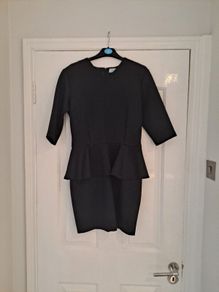 Elegant black peplum dress