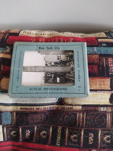 Old postcard album with 80 cards from 1914 to 1955,plus 10 miniature photos of New York,5 old John Hinde,postcards,3 old Iraqui postcards