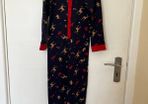 Leigh Tucker christmas pj's onesie