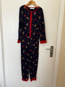 Leigh Tucker christmas pj's onesie