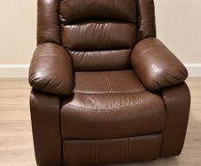 Brown leather recliner armchair