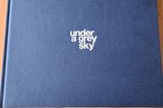 Under A GREY Sky. By Simon Burch. This Book Of Photos  Follows The landscape,people, &amp; Towns Affected By The Collaps Of Board Na Mona's Peat Mining  Industry. IN IRELAND.