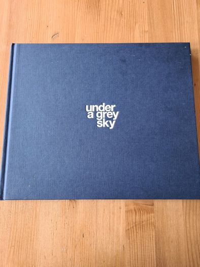Under A GREY Sky. By Simon Burch. This Book Of Photos  Follows The landscape,people, & Towns Affected By The Collaps Of Board Na Mona's Peat Mining  Industry. IN IRELAND.