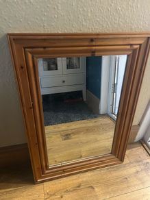 Mirror in wooden frame