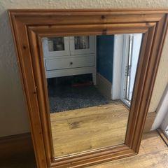 Mirror in wooden frame