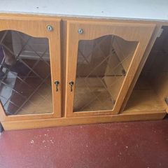 Free wooden cabinet with glass doors  good condition