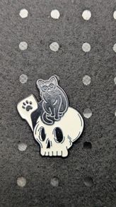 Cute cat and skull enamel pin